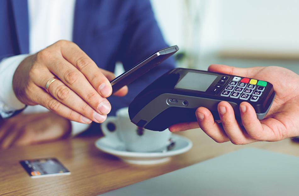 picture of someone paying with their phone