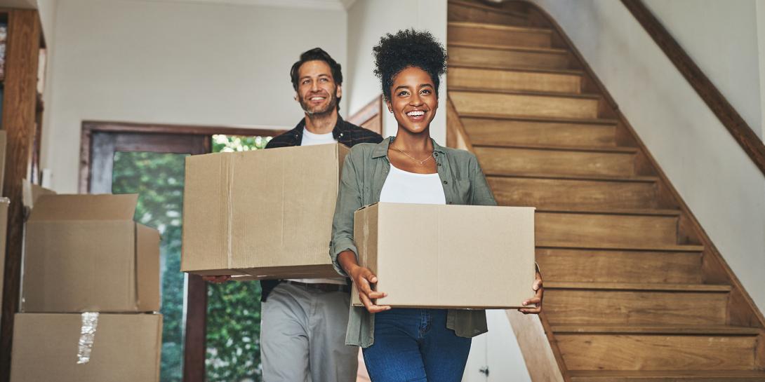 couple holding boxes